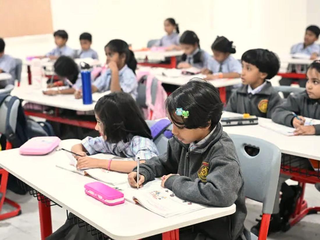 Students learning at Arkaas Vignan School Primary students working at their desks in an Arkaas classroom