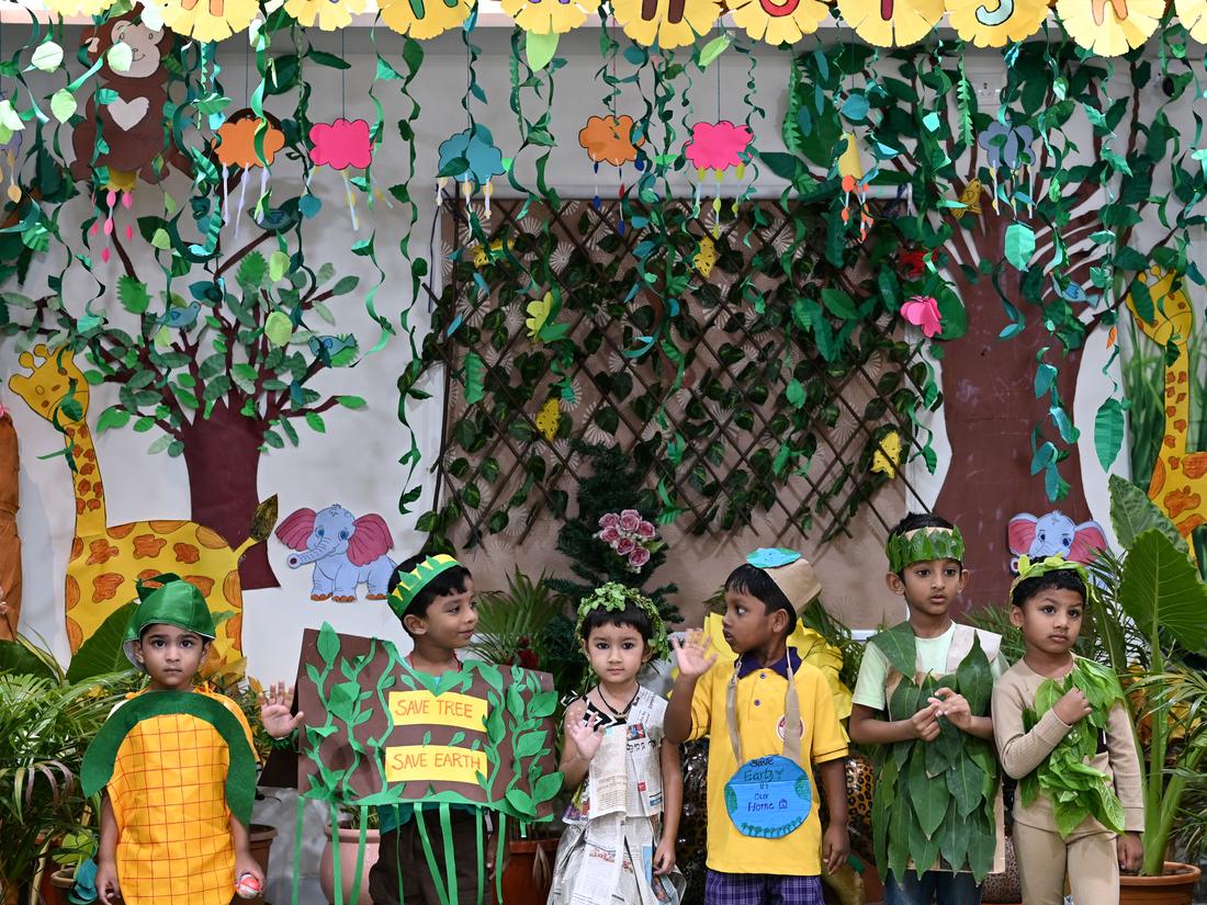 Arts & Expression Children in colourful costumes on stage