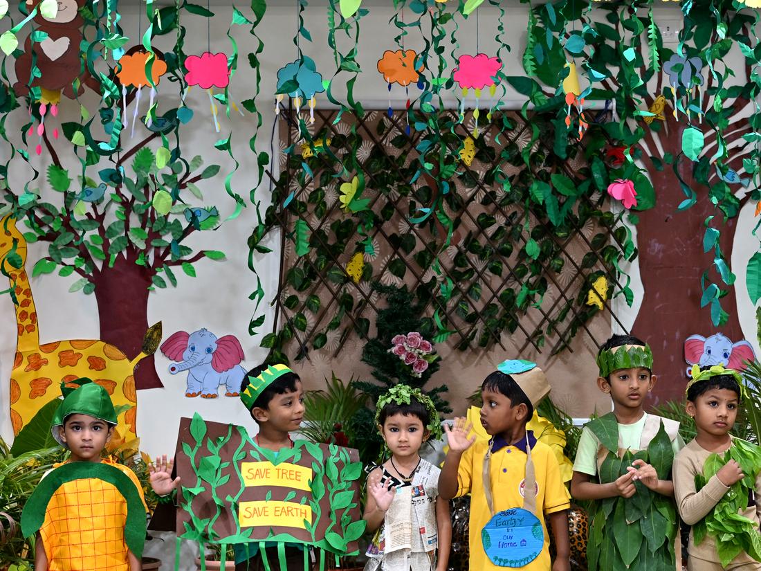 Young children in costumes at a school celebration